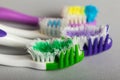 Manual toothbrushes of different degree of rigidity