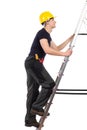 Manual worker climbing a ladder. Royalty Free Stock Photo