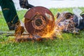 Manual worker cutting steel machine is cutting steel pipe Royalty Free Stock Photo