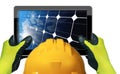 Manual Worker Holding a Digital Tablet Computer with a Solar Panel Royalty Free Stock Photo