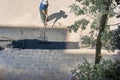 Manual worker tamping asphalt. top view