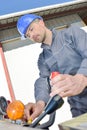 Manual worker working on machinery in metal industry Royalty Free Stock Photo