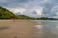 MANUEL ANTONIO, COSTA RICA - MAY 13, 2016: People on a beach in Manuel Antonio village, Costa Ri