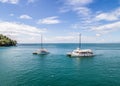 Manuel Antonio Costa Rica 02.11.2019 white catamaran yacht excursion in blue bay with empty beach Central America Royalty Free Stock Photo