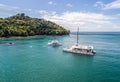 Manuel Antonio Costa Rica 02.11.2019 white catamaran yacht excursion in blue bay with empty beach Central America Royalty Free Stock Photo