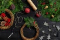 Manufacturer of Christmas decor with their own hands. Christmas wreath for the holiday. The new year celebration. Top Royalty Free Stock Photo