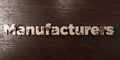 Manufacturers - grungy wooden headline on Maple - 3D rendered royalty free stock image