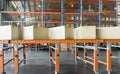 Manufacturing warehouse sorting with shipment boxes on conveyor belt. Royalty Free Stock Photo