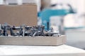 Manufacturing of wooden furniture in a factory. A set of drills for wood. Selective focus Royalty Free Stock Photo