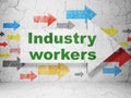 Manufacuring concept: arrow with Industry Workers on grunge wall background Royalty Free Stock Photo