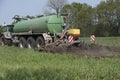 Agriculture, spreading manure. Germany, Europe Royalty Free Stock Photo