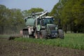 Agriculture, spreading manure. Germany, Europe Royalty Free Stock Photo