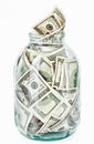 Many 100 US dollars bank notes in a glass jar Royalty Free Stock Photo