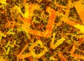 Many abstract chaotic orange alphabet letters