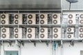 Many air conditioners units compressor are attached to the sides of large buildings Royalty Free Stock Photo
