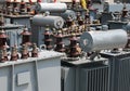 many alienated old electrical transformers in the storage before Royalty Free Stock Photo
