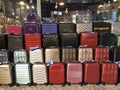 Many aluminum and polycarbonate suitcases in a Shopping.