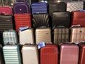 Many aluminum and polycarbonate suitcases in a Shopping.