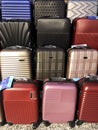 Many aluminum and polycarbonate suitcases in a Shopping.