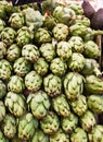 Many artichokes on a market stall Royalty Free Stock Photo