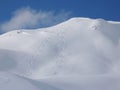 Backcountry ski tracks in deep powder snow in winter in the Swiss Alps near St. Antoenien