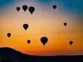 many balloons great and small in dawn yellow and blue flight Royalty Free Stock Photo