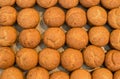 Many banana muffins. stack of banana muffins on a black plate closeup. Banana Cupcake Delicious Homemade on wood tray Freshly bake