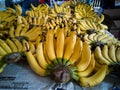 Many bananas on the table in the shop. Royalty Free Stock Photo
