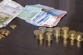 Many banknotes and coins, Royalty Free Stock Photo