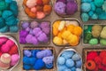 Many baskets made of natural eco-friendly materials. Multicolor yarn for knitting, knitting needles and scissors. Home Royalty Free Stock Photo