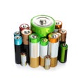 Many batteries of different types on white background