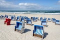 Many beach chairs on sand beach in Northern Germany