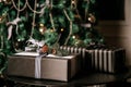 Many beautiful Christmas presents lie under the tree on the floor Royalty Free Stock Photo