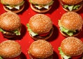 Many beef burgers cheeseburgers with vegetables and sauce pattern on red background.Macro.AI Generative Royalty Free Stock Photo