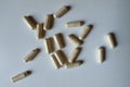 Many beige capsules of Saccharomyces boulardii probiotic from above