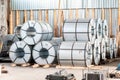 Bended metal sheet rolls in factory warehouse. metal engineering Royalty Free Stock Photo