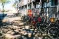 Many bicycles are parked on a city street Royalty Free Stock Photo