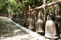 Many big metal bell at Wat Phra That Doi Tung in Chiang Rai, Thailand Royalty Free Stock Photo