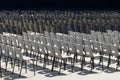 Many black and white plastic chairs were set up with the row and column for outdoor concerts or open air events . Empty seats Royalty Free Stock Photo