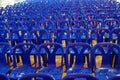 Many blue plastic chairs at a restaurant in a school.Chairs with nobody sit. Royalty Free Stock Photo