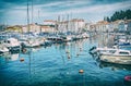 Many boats in harbor and old town Piran, Slovenia