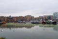 Many boats parked inside canary wharf bay UK