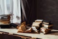 Many books are on the table at home in the library