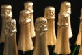 Many bottles of champagne on dark background