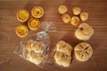 Many breads laid on a wooden table