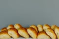 Many breads are placed in a tray with a gray background Royalty Free Stock Photo