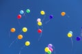 Many bright baloons in the blue sky Royalty Free Stock Photo