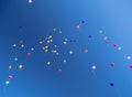 Many bright baloons in the blue sky Royalty Free Stock Photo