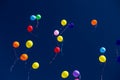 Many bright baloons in the blue sky Royalty Free Stock Photo