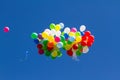 Many bright baloons in the blue sky Royalty Free Stock Photo